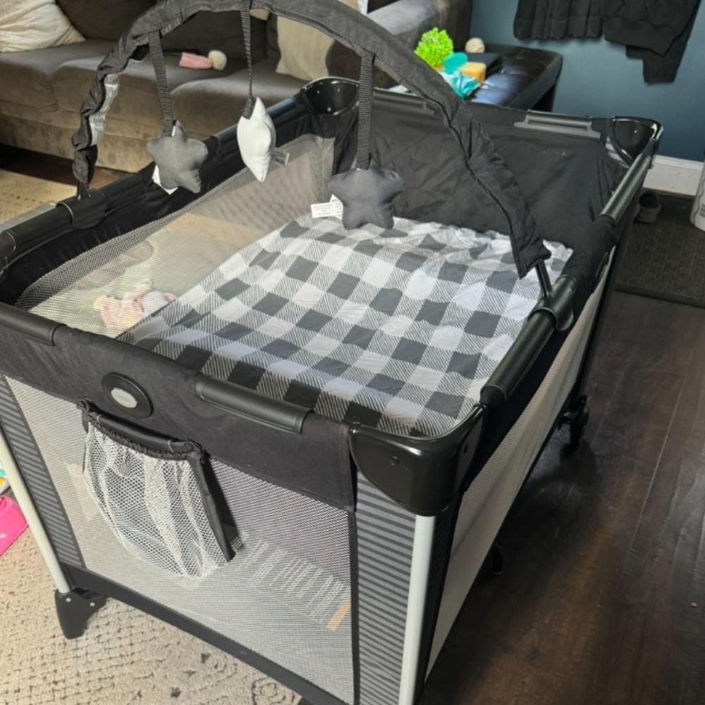 Black and Gray Portable Pack N Play